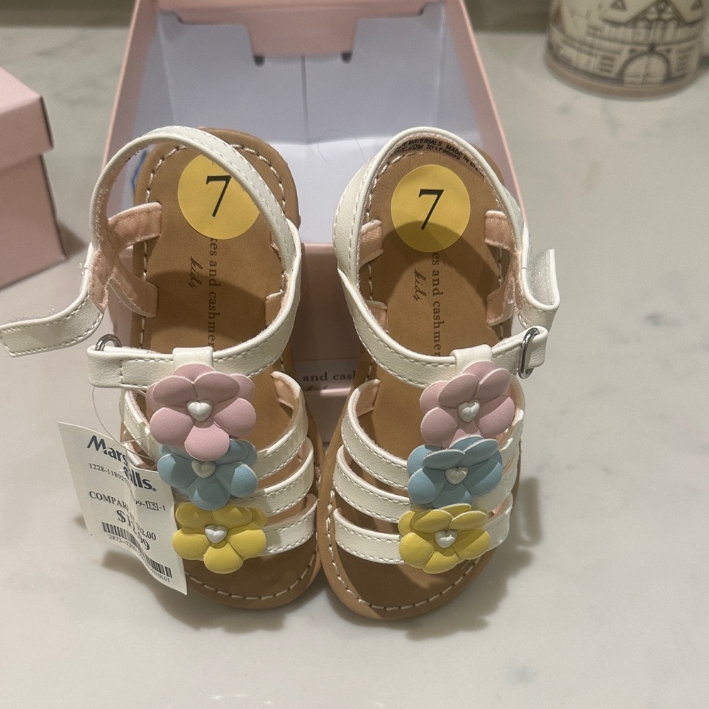 cupcakes & cashmere White Sandals with Colorful Flower Accents